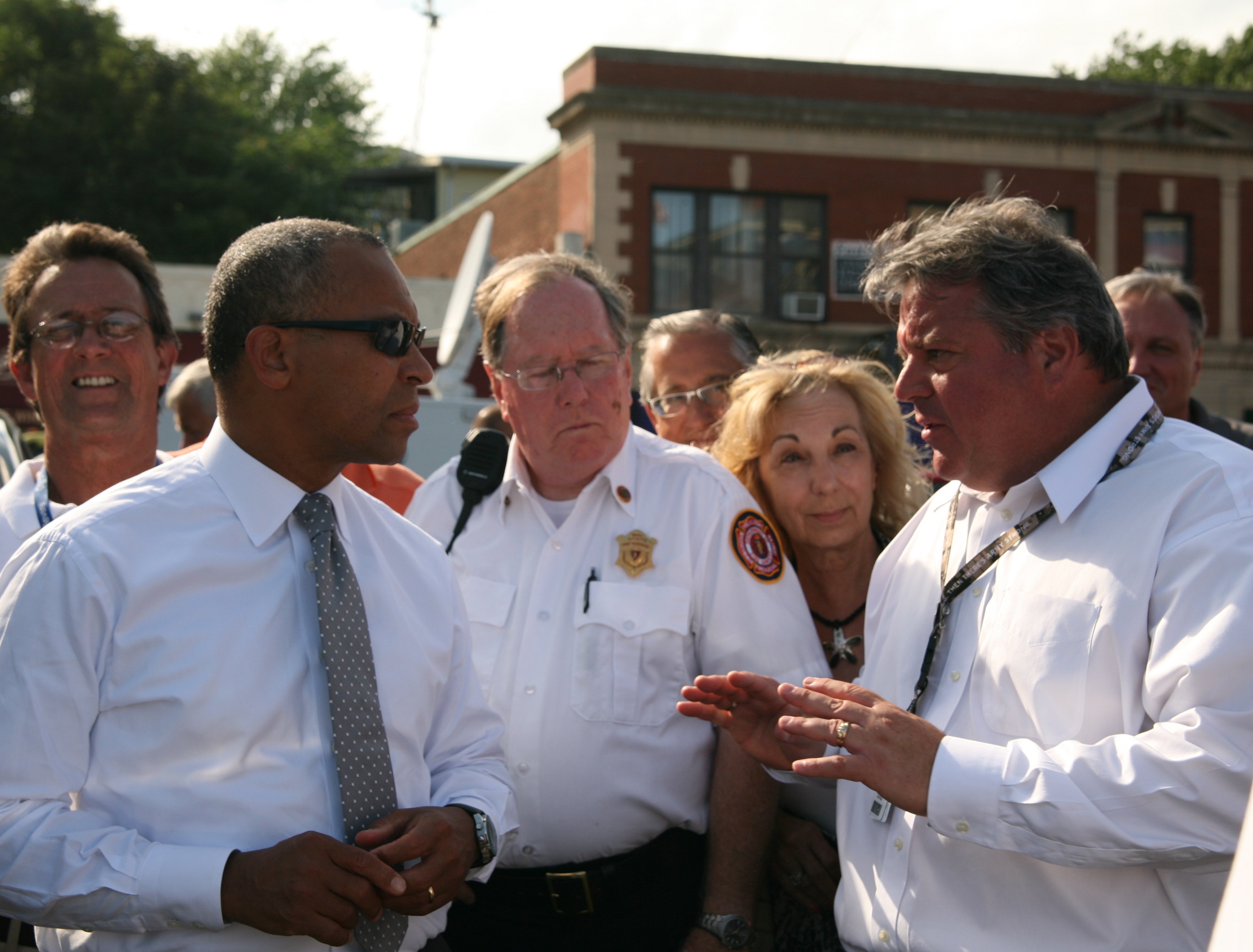 Mayor Dan Rizzo and Gov. Deval Patrick – along with other city and state officials (including State Fire Marshal Stephen Coan) – spoke about the disaster prior to a press conference late in the afternoon on Monday. The meeting took place on the American Legion Lawn as City Hall was not yet safe to enter.