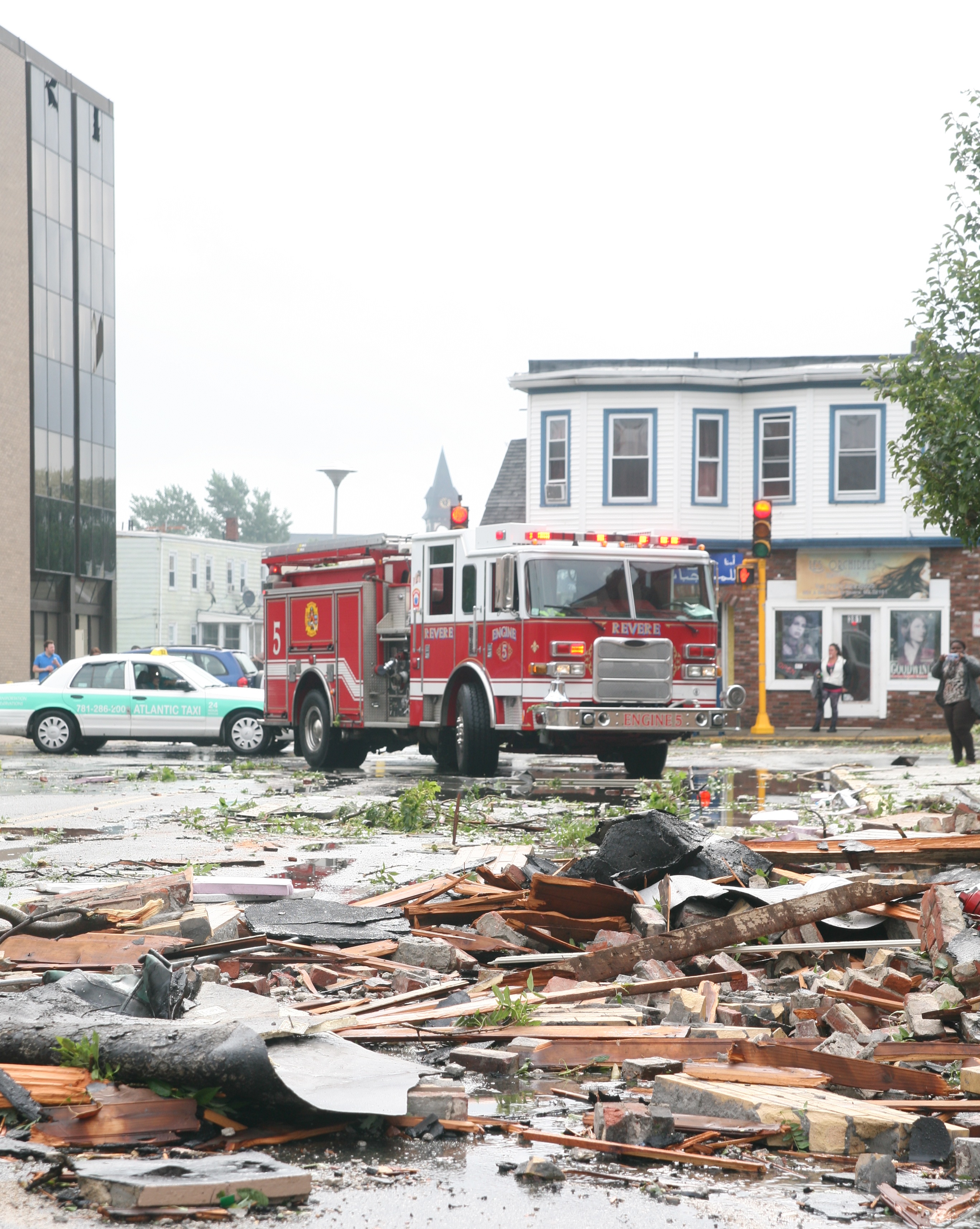 Engine 5 tries to wade through the debris-strewn streets to check on the situation.
