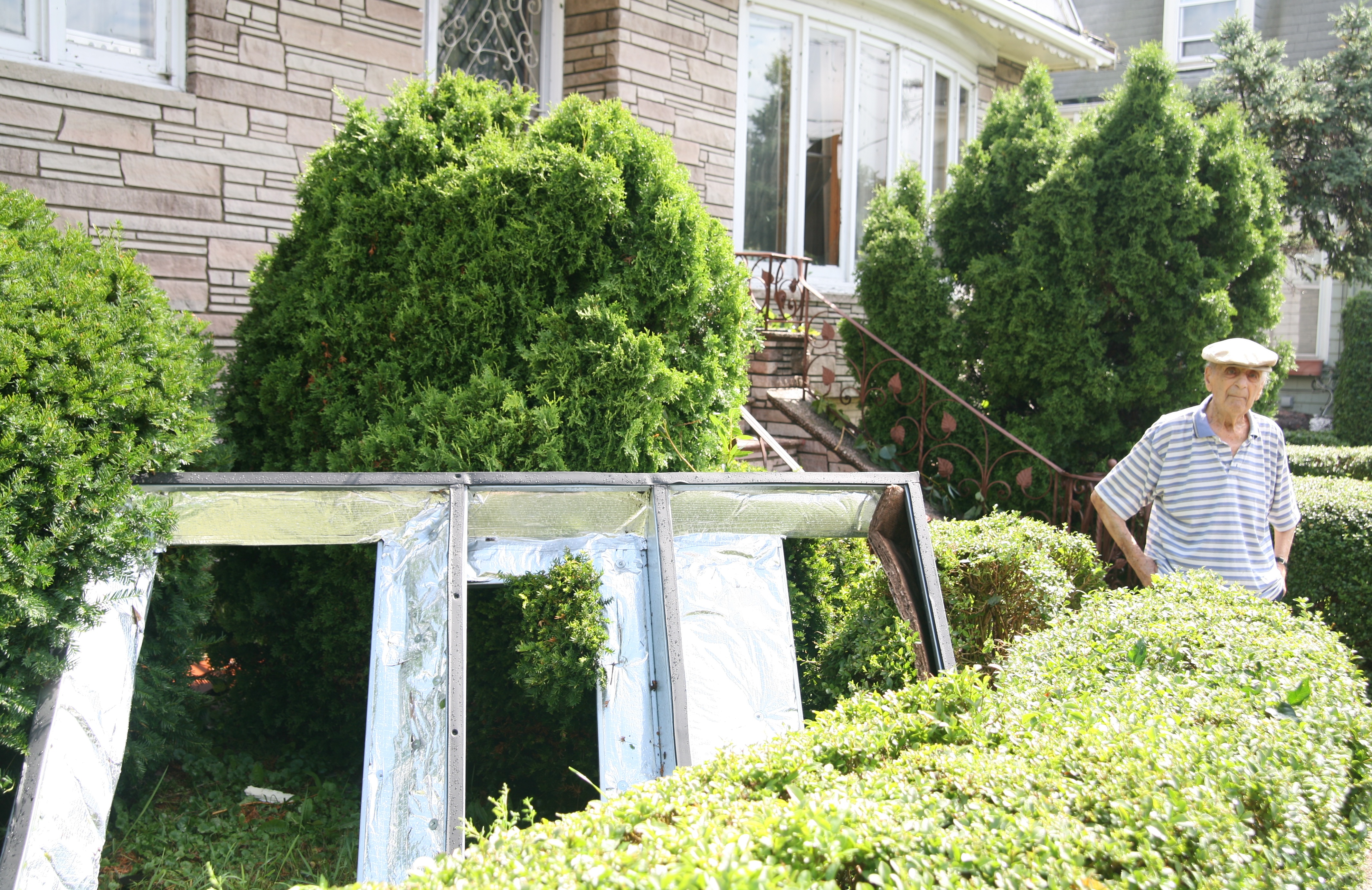 Frank Bellofatto of Mountain Avenue came out of his home to find the top of the Rite Aid sign in his front yard.