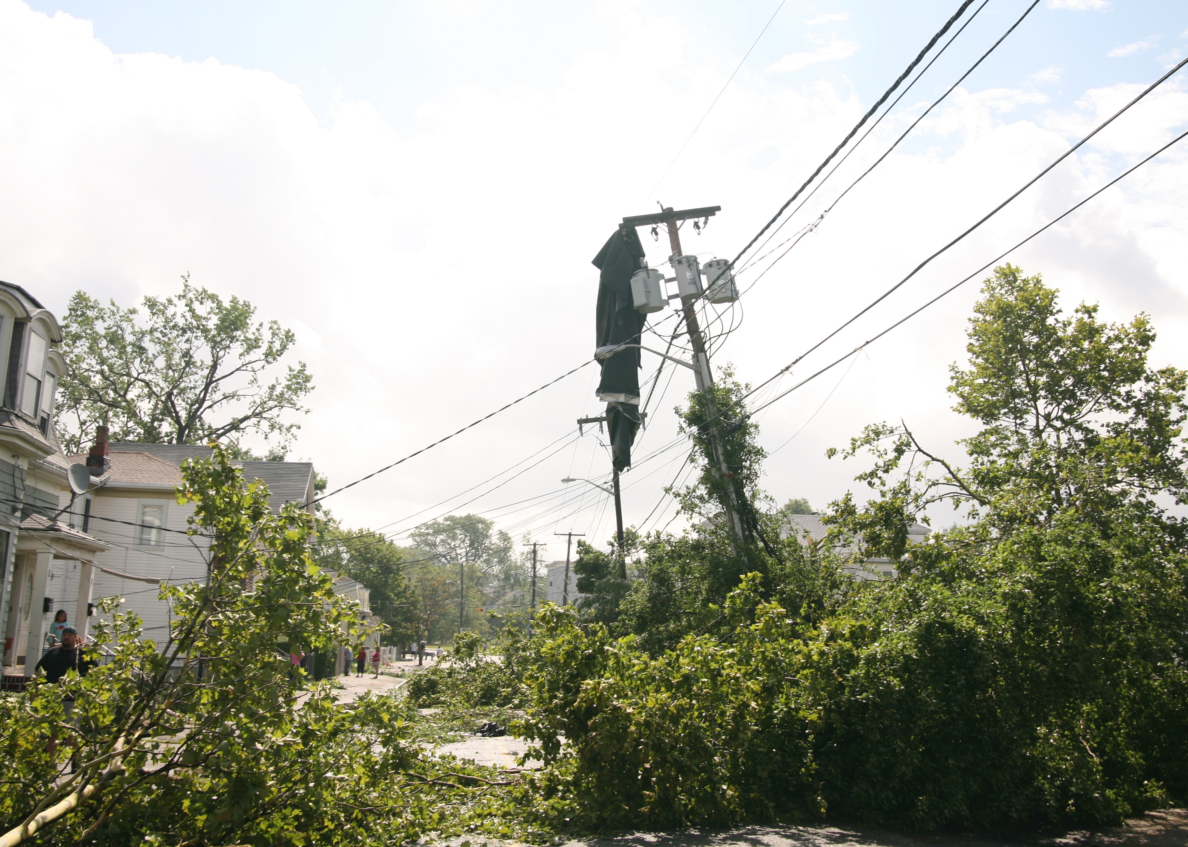 Trees made Mountain Avenue impassable and a piece of roofing material hung perilously from a pole with three electrical transformers.