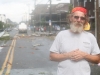 Trucker Douglas Knisely of Pennsylvania was in his rig (behind him) on Park Avenue when the tornado hit. He had just rolled into town to make a delivery to the Hill School. He called it â€˜The Finger of God.â€™